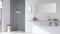 Das Bild zeigt eine Spiegelheizung als elektrischer Badheizkörper im modernen Badezimmer